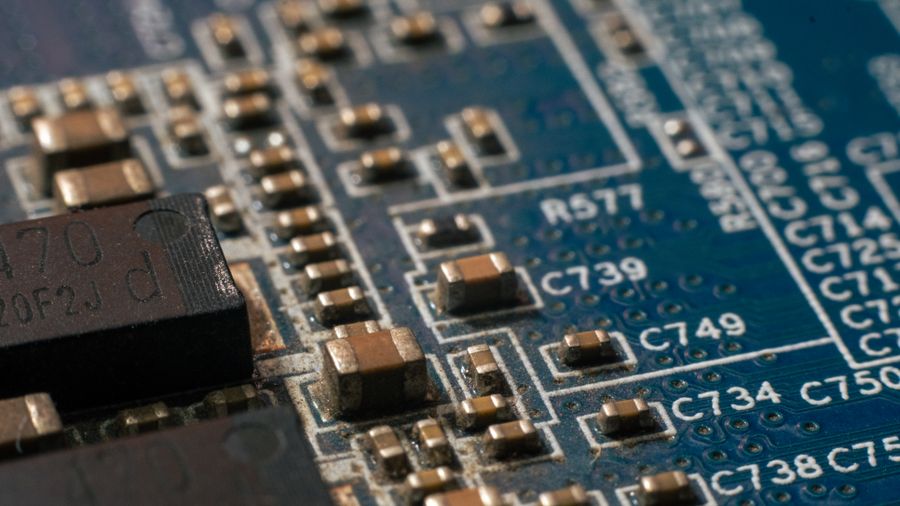 Close-up of surface-mounted components and precision circuit board traces
